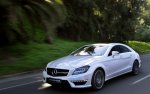 2012-mercedes-benz-cls63-amg-front-left-side-view-driving-white.jpg
